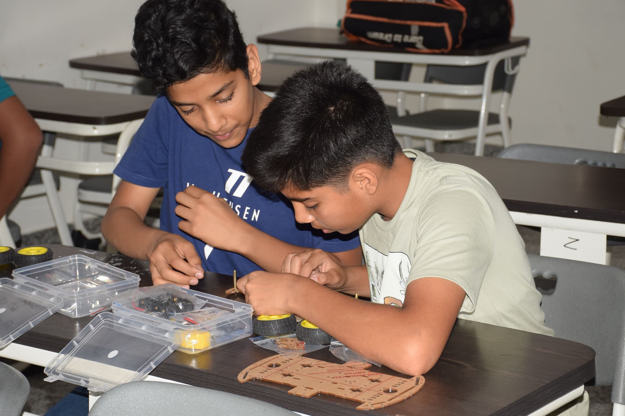 STEM-X Lab founders with students